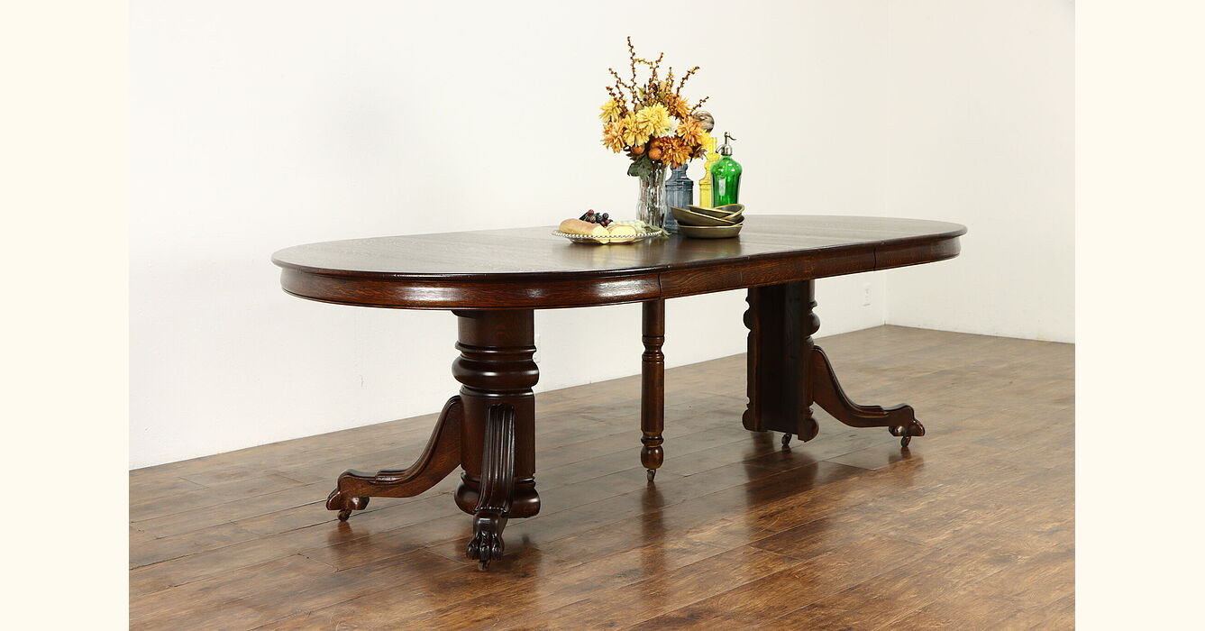 Oak Antique 4' Round Dining Table, Lion Paw Feet, 4 Leaves, Extends 8'