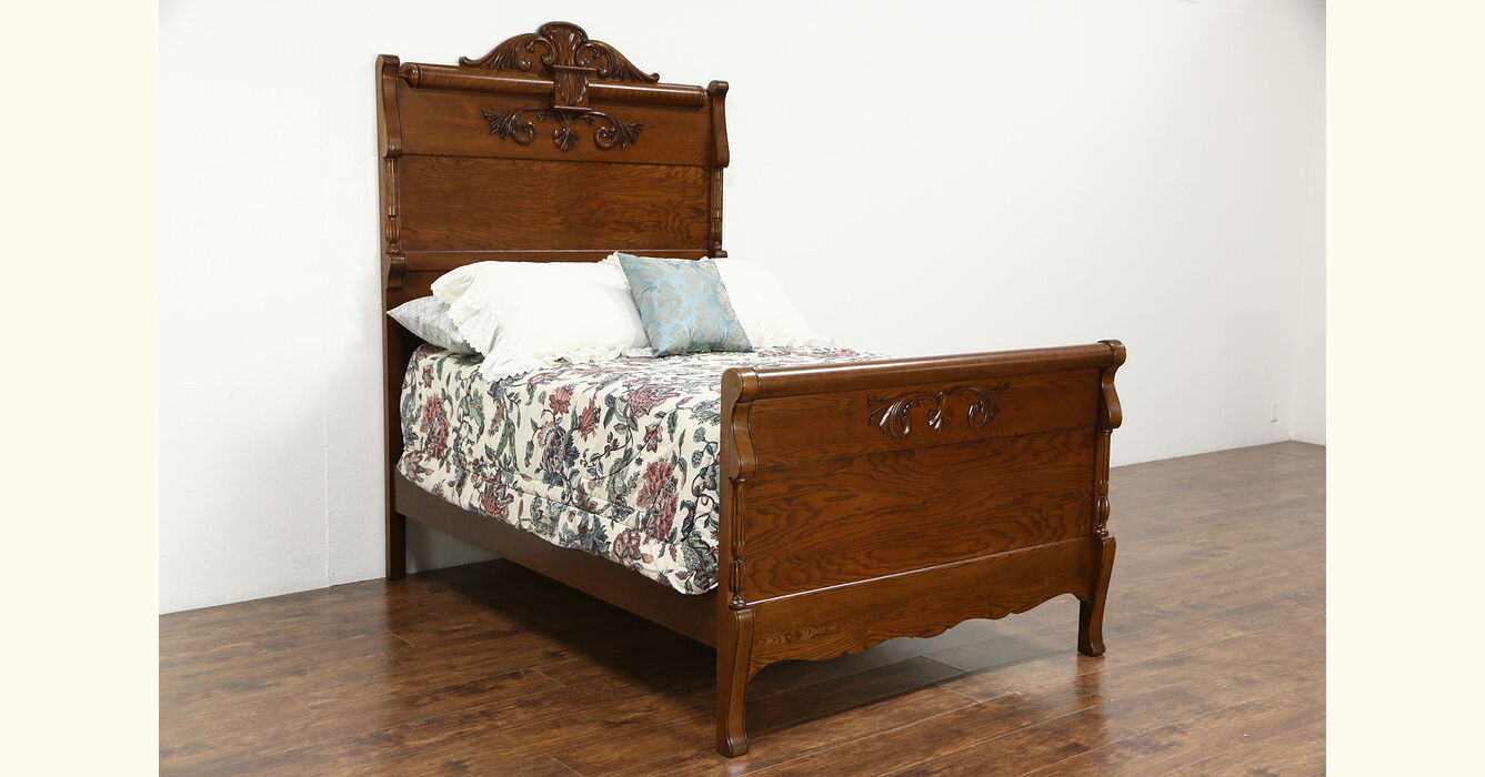 antique carved oak bed